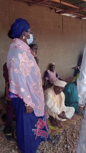 Comm for Women Affairs with residents at the Resettlement area